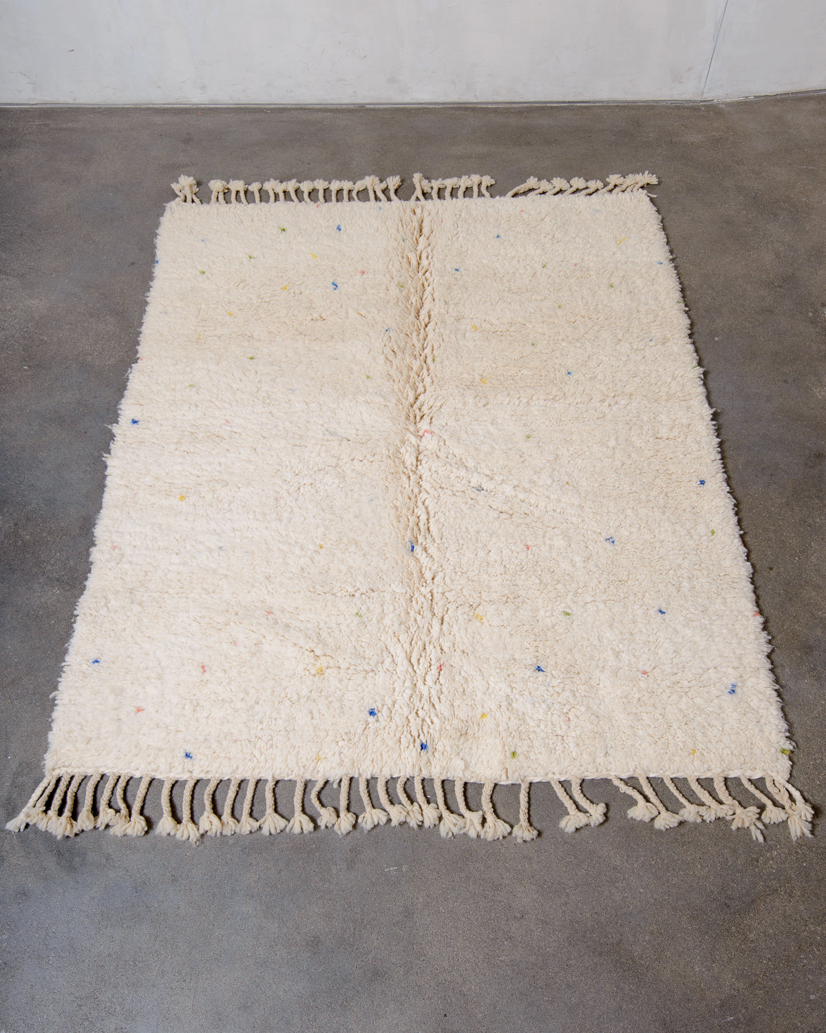 Modern, designer, handcrafted Berber rug from Morocco. Beniourain carpet with beautiful colours and patterns and fluffy wool texture.